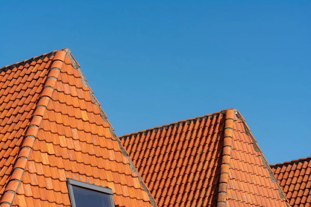 Clay barrel tile rooflines on homes in Cleveland, TN